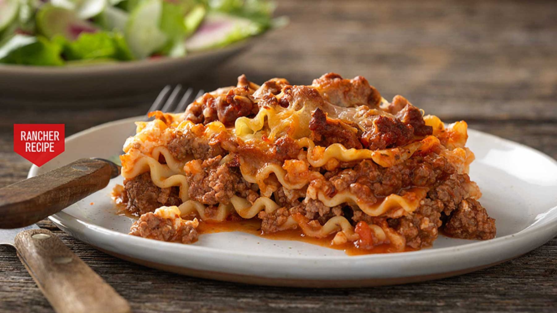 http://www.beefitswhatsfordinner.com/Media/BIWFD/Images/rancher-recipe-farmous-lasagna-horizontal-with-icon-2.jpg